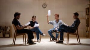 Group therapy session in a circle — anxiety, PTSD and addiction together without requiring sobriety before trauma work
